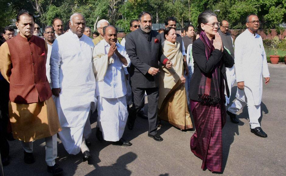 Congress President Sonia Gandhi leads a march of party leaders from the AICC headquarters to the residence of former Prime Minister Manmohan Singh in New Delhi on Thursday to express solidarity with him. Singh has been summoned as accused by a court in a coal scam case. PTI 