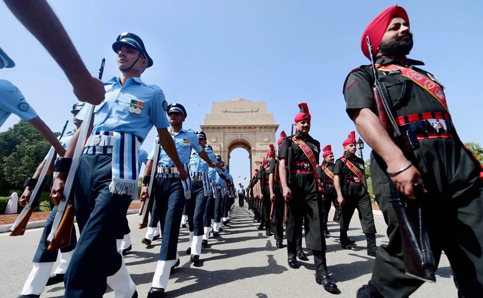 New Delhi: Soldiers march after the wreath laying ceremony at India Gate War Memorial on Centenary Commemoration of World War I in New Delhi on Monday. PTI 