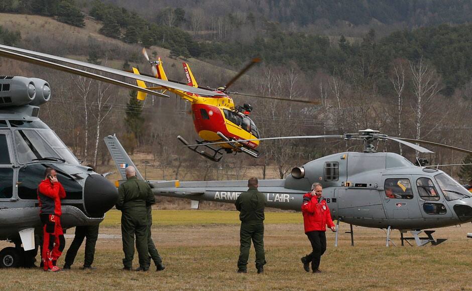 Rescue helicopters from the French Securite Civile and the Air Force are seen in front of the French Alps during a rescue operation near to the crash site of an Airbus A320, near Seyne-les-Alpes, March 24, 2015. An Airbus plane operated by Lufthansa's Germanwings budget airline, en route from Barcelona to Duesseldorf, crashed in a remote snowy area of the French Alps on Tuesday and all 150 on board were feared dead. REUTERS