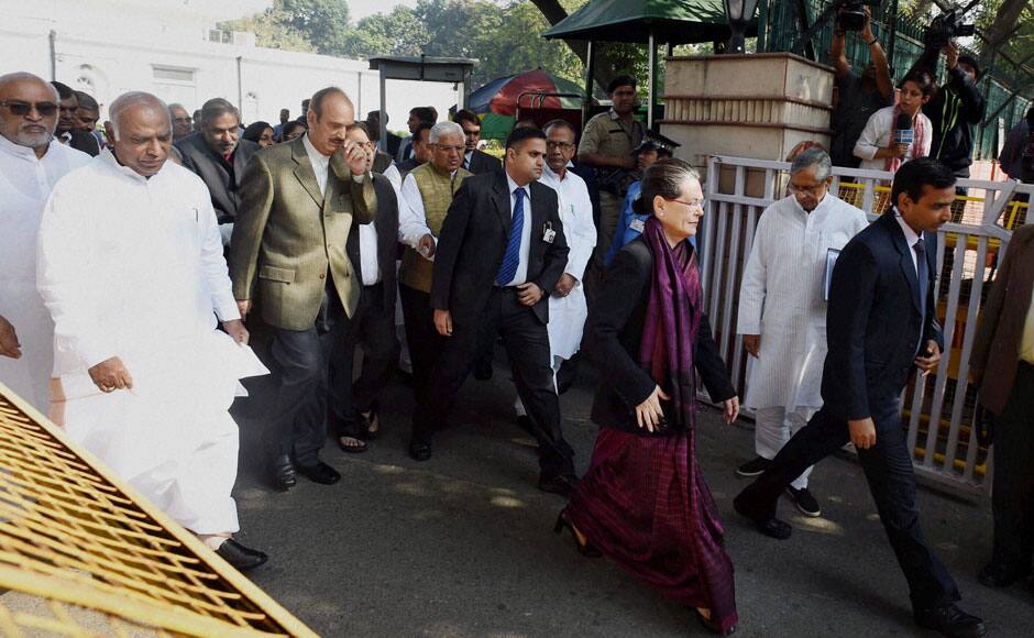 Congress President Sonia Gandhi leads a march of party leaders from the AICC headquarters to the residence of former Prime Minister Manmohan Singh in New Delhi on Thursday to express solidarity with him. Singh has been summoned as accused by a court in a coal scam case. PTI 