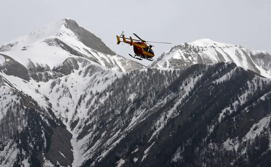 A rescue helicopter from the French Securite Civile flies over the French Alps during a rescue operation after the crash of an Airbus A320, near Seyne-les-Alpes, March 24, 2015. An Airbus plane operated by Lufthansa's Germanwings budget airline, en route from Barcelona to Duesseldorf, crashed in a remote snowy area of the French Alps on Tuesday and all 150 on board were feared dead. REUTERS