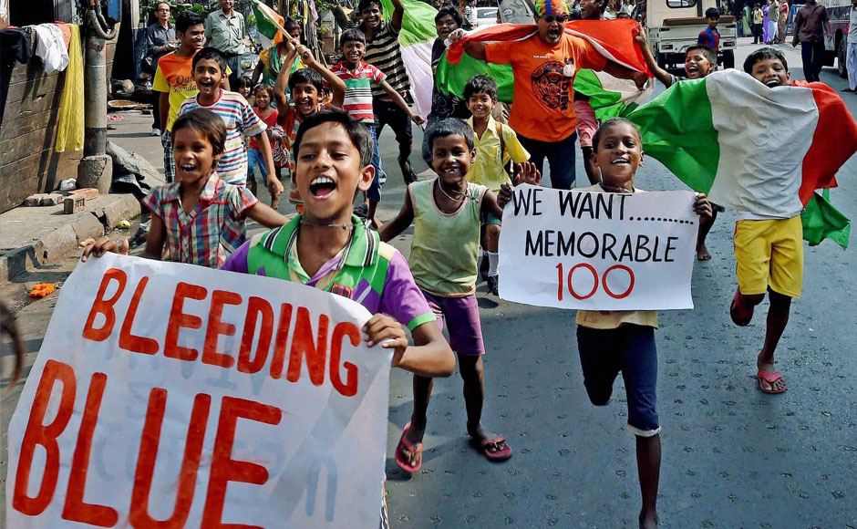 Children wish good luck for the Indian Cricket Team ahead of their World Cup clash against Australia in the semi-finals, in Kolkata on Wednesday. PTI