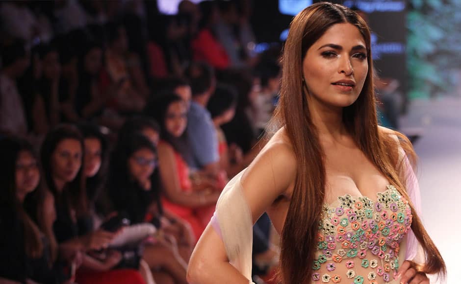A model walks the ramp displaying an outfit by Indian designer Arpita Mehta, during the Lakme Fashion Week Summer/Resort 2015, in Mumbai, India on March 21, 2015. Solaris Images