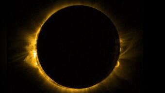Photos: Thousands catch glimpse of 'breathtaking' solar eclipse
