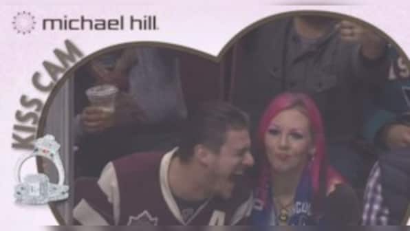 Kiss cam fail: Boyfriend chooses beer over girlfriend