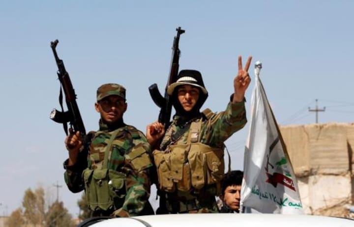 U.S.-led coalition, Iraqis pound Islamic State in Tikrit