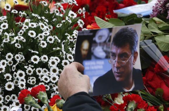 Death threats and a late night dinner before Russia's Nemtsov was shot dead Death threats and a late night dinner before Russia's Nemtsov was shot dead