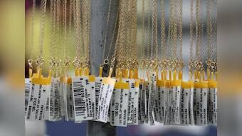 Gold near 2-1/2 week high on U.S. rate expectations