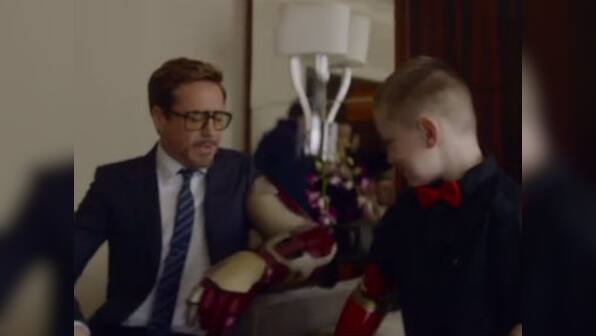 A real superhero: 'Iron Man' Robert Downey Jr presents boy with bionic arm 