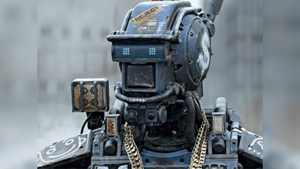 Chappie review: Dev Patel, Hugh Jackman, his mullet and a robot in an oddball film  