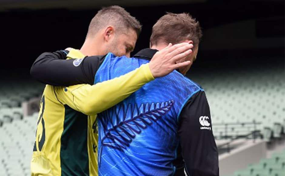 Captains Brendon McCullum of New Zealand and Michael Clarke of Australia chat as they leave the field during the 2015 ICC Cricket World Cup Final press conference at Melbourne Cricket Ground on March 28, 2015 in Melbourne, Australia. AFP