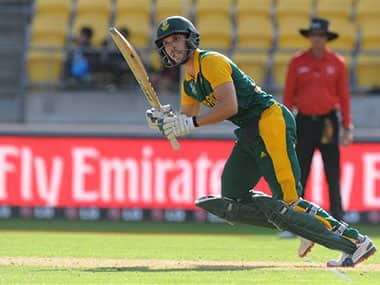South Africa's Farhaan Behardien hits the ball to the boundary while batting against the United Arab Emirates. AP