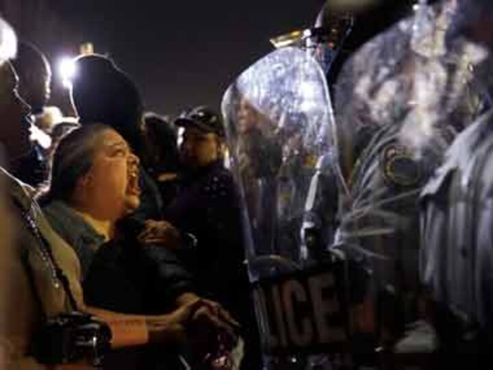 Michael Brown shooting: 2 officials shot during protest over resignation of police chief at Ferguson