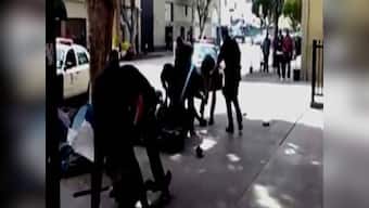 LA Police officers shoot man over gun struggle