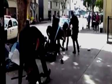 LA Police officers shoot man over gun struggle LA Police officers shoot man over gun struggle