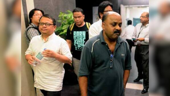 Malaysia police arrest three editors on sedition charges