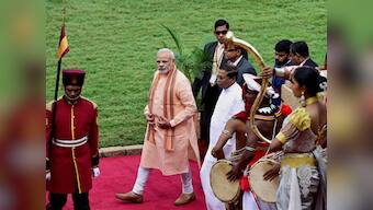 28 years after Rajiv Gandhi's near disastrous visit, confident PM Modi strides into Sri Lanka