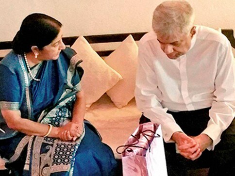 Sushma Swaraj takes up fishermen issue with Lanka PM Wickramasinghe Sushma Swaraj takes up fishermen issue with Lanka PM Wickramasinghe