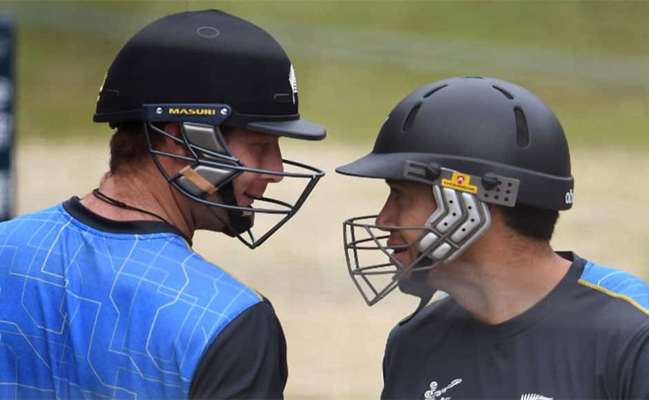 Martin Guptill (L) and Ross Taylor (R) share a lighter moment in the nets. AFP