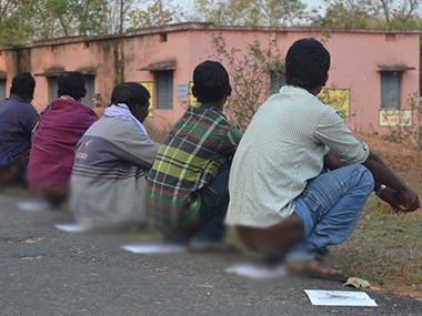 Adivasis, likely to be affected by the proposed legislation, defecating on copies of the bill. Image: Facebook/Abhay Xaxa