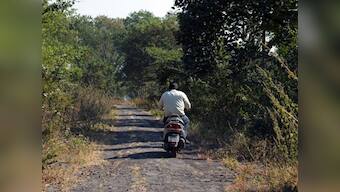 Tyrant or helpless parent? Father ties 7-year-old girl to bike and drags her to school for test