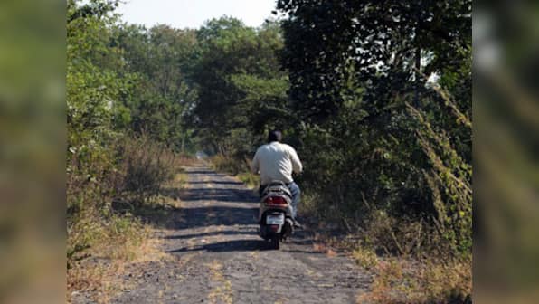 Tyrant or helpless parent? Father ties 7-year-old girl to bike and drags her to school for test