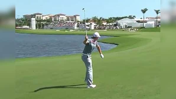Watch: Rory McIlroy loses temper and launches golf club into a lake after bad shot