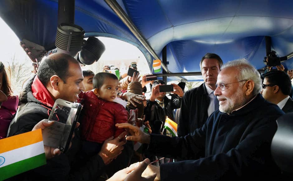 Hannover: Prime Minister Narendra Modi meets Indian community on his arrival at a hotel in Hannover on Sunday. PTI