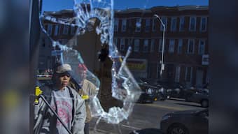Baltimore on edge: Obama raises questions on race relations as riot control took over city