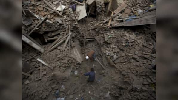 Nepal: Crowds roar and cheer as teenage boy rescued after five days under rubble 