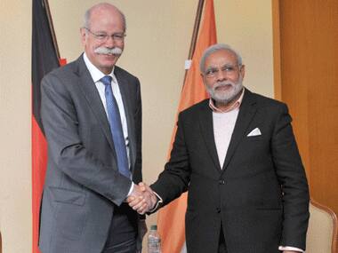 Prime Minister Narendra Modi meeting the CEO, Daimler AG, Dieter Zetsche, in Hannover, Germany on Sunday. PTI