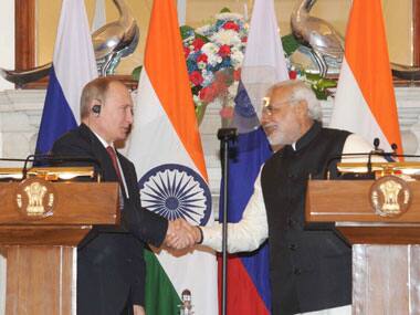 Prime Minister Narendra Modi and Russian President Vladimir Putin at the joint press statements, in New Delhi on 11 December 2014. Image courtesy PIB