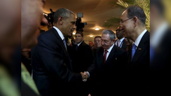 Historic handshake: Obama shakes hands with Cuban President Raul Castro, sets stage for reconciliation