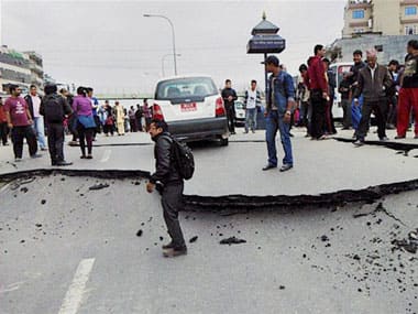 A damaged road after a powerful earthquake in Kathmandu on Saturday. PTI 