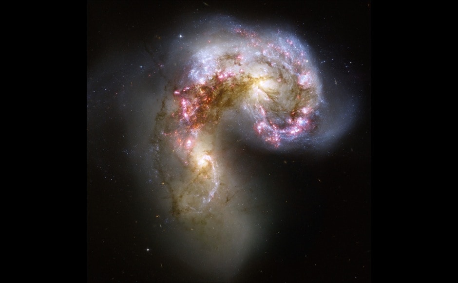 This Hubble image of the Antennae galaxies is the sharpest yet of this merging pair of galaxies. As the two galaxies smash together, billions of stars are born, mostly in groups and clusters of stars. The brightest and most compact of these are called super star clusters. FOR EDITORIAL USE ONLY REUTERS/NASA, ESA/Hubble, and B. Whitmore (Space Telescope Science Institute)/Handout (UNITED STATES) - RTR1IFD3