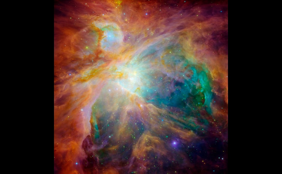This image of the Orion nebula, taken by NASA's Spitzer and Hubble Space Telescopes and released November 7, 2006, shows an infrared and visible-light composite that indicates that a 