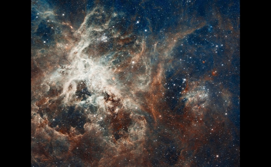This new Hubble telescope image comprises one of the largest mosaics ever assembled from Hubble photos and includes observations taken by Hubble's Wide Field Camera 3 and Advanced Camera for Surveys released by NASA and the Space Telescope Science Institute (STScI) in Baltimore in celebration of Hubble's 22nd anniversary on April 17, 2012. Several million young stars are vying for attention in a new NASA Hubble Space Telescope image of a raucous stellar breeding ground in 30 Doradus, a star-forming complex located in the heart of the Tarantula nebula. REUTERS/NASA, ESA, D. Lennon and E. Sabbi (ESA/STScI), J. Anderson, S. E. de Mink, R. van der Marel, T. Sohn, and N. Walborn (STScI), N. Bastian (Excellence Cluster, Munich), L. Bedin (INAF, Padua), E. Bressert (ESO), P. Crowther (University of Sheffield), A. de Koter (University of Amsterdam), C. Evans (UKATC/STFC, Edinburgh), A. Herrero (IAC, Tenerife), N. Langer (AifA, Bonn), I. Platais (JHU), and H. Sana (University of Amsterdam)/Handout (UNITED STATES - Tags: ENVIRONMENT SCIENCE TECHNOLOGY) FOR EDITORIAL USE ONLY. NOT FOR SALE FOR MARKETING OR ADVERTISING CAMPAIGNS. THIS IMAGE HAS BEEN SUPPLIED BY A THIRD PARTY. IT IS DISTRIBUTED, EXACTLY AS RECEIVED BY REUTERS, AS A SERVICE TO CLIENTS - RTR30UUO