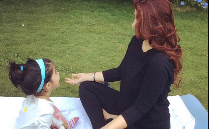 Baba Ramdev, you've got some tough competition from my two-year old, tweets Twinkle Khanna 