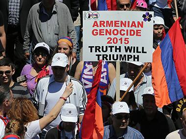 Lebanese Armenians march with flags and placards on the Antelias highway, north of Beirut. AFP