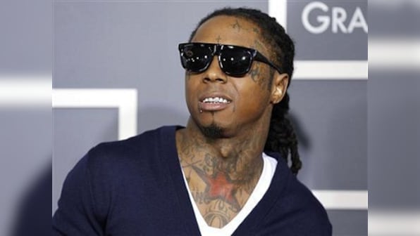 Gunmen open fire on two buses carrying rap star Lil Wayne and his entourage