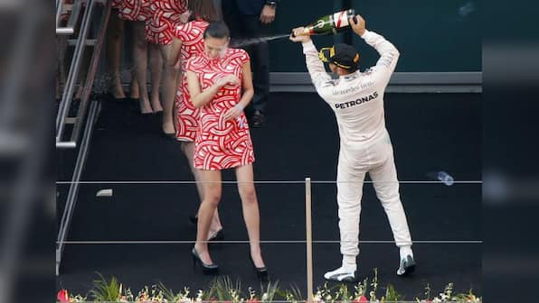 Chinese GP hostess plays down Lewis Hamilton champagne incident