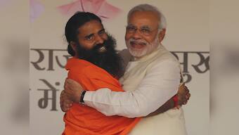 After cabinet rank, Ramdev finds a political home in BJP's warm embrace