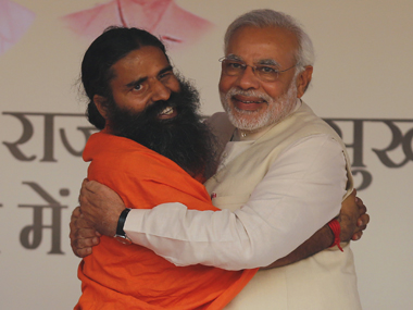 After cabinet rank, Ramdev finds a political home in BJP's warm embrace After cabinet rank, Ramdev finds a political home in BJP's warm embrace