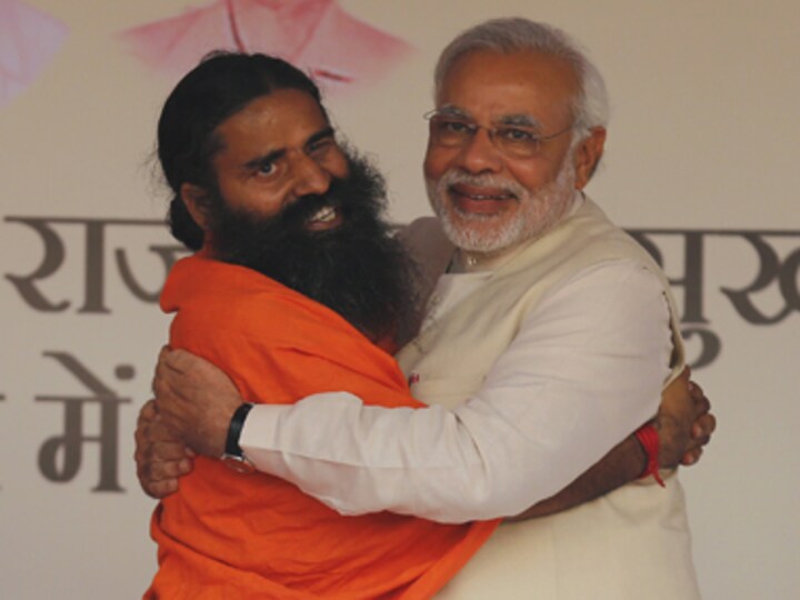 After cabinet rank, Ramdev finds a political home in BJP's warm embrace