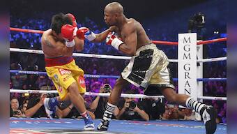 Photos: Mayweather beats Pacquiao to become the undisputed welterweight champion of the world