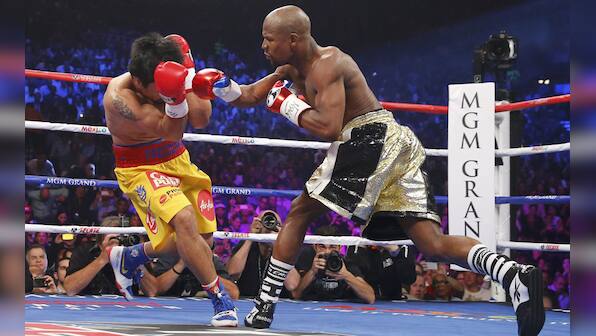 Photos: Mayweather beats Pacquiao to become the undisputed welterweight champion of the world