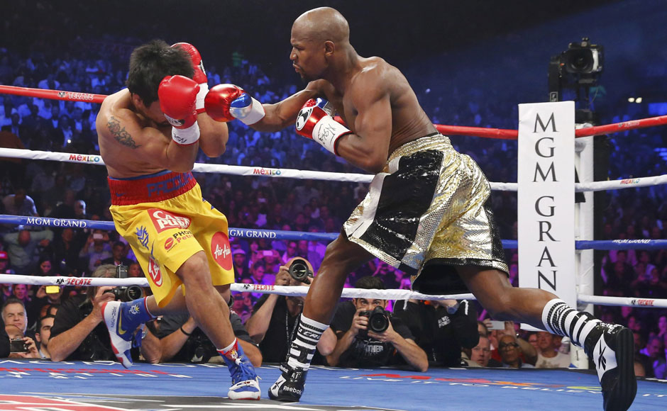Photos: Mayweather beats Pacquiao to become the undisputed welterweight champion of the world Photos: Mayweather beats Pacquiao to become the undisputed welterweight champion of the world