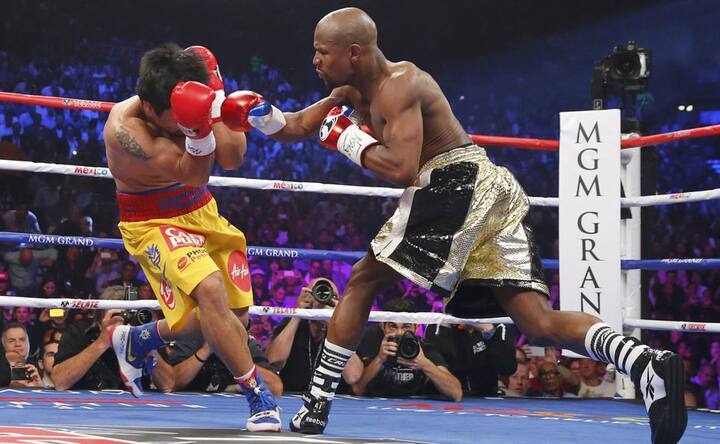 Photos: Mayweather beats Pacquiao to become the undisputed welterweight champion of the world