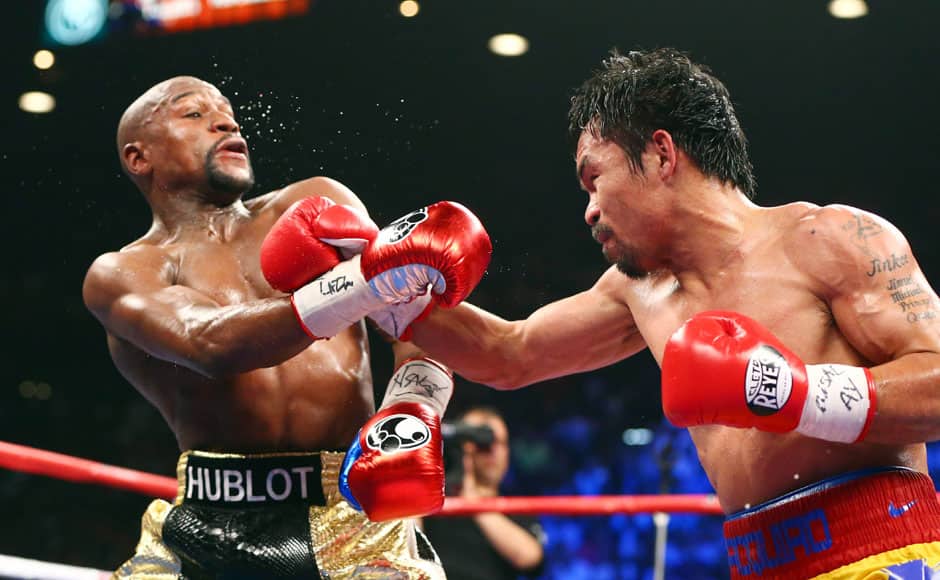 May 2, 2015; Las Vegas, NV, USA; Floyd Mayweather and Manny Pacquiao box during their world welterweight championship bout at MGM Grand Garden Arena. Photo Credit: Mark J. Rebilas-USA TODAY Sports