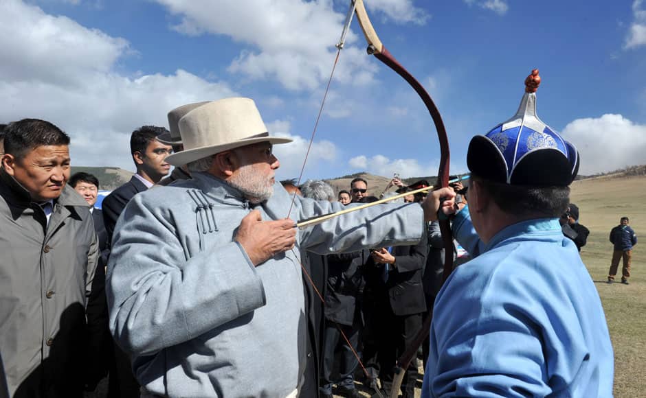 The Prime Minister, Shri Narendra Modi trying his hand on archery at Mini Naadam Festival, in Ulaanbaatar, Mongolia on May 17, 2015.